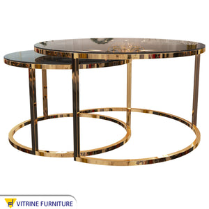 2 interlocking circular coffee tables