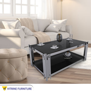 Rectangular steel table with black glass