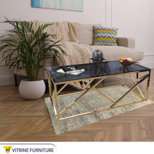 Rectangular table with a decorative steel frame