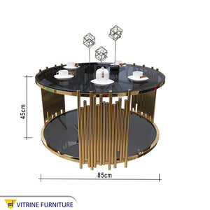 Golden circular table with two living surfaces