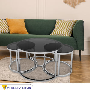 Three tables with a silver frame