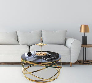 Circular table with golden blown chassis