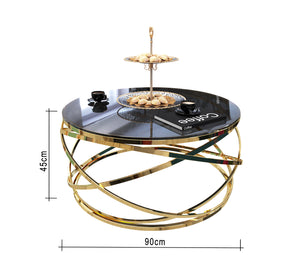 Circular table with golden blown chassis