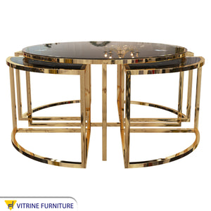 A circular table with four small tables