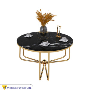 Circular table with Spanish marble top