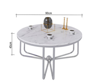 Circular table with three-legged chassis