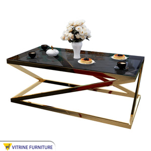 Rectangular table with gold letter Z chassis