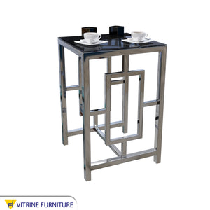 Side table with decorated steel chassis