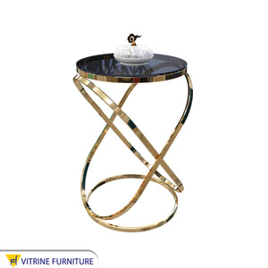 Side table with interlocking oval chassis