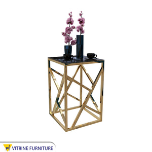 Square side table with decorations