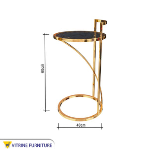 طاولة دائرية بسطح زجاجى اسود