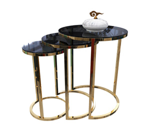 Three stainless steel side tables