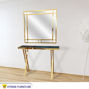 Console with golden mirror