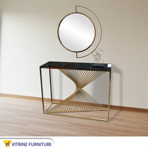 Decorative console and golden circular mirror