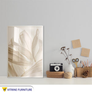 An artistic painting in dreamy colors and a white frame