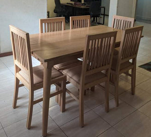 Wooden dining table with six chairs