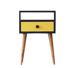 Black dresser with yellow drawer