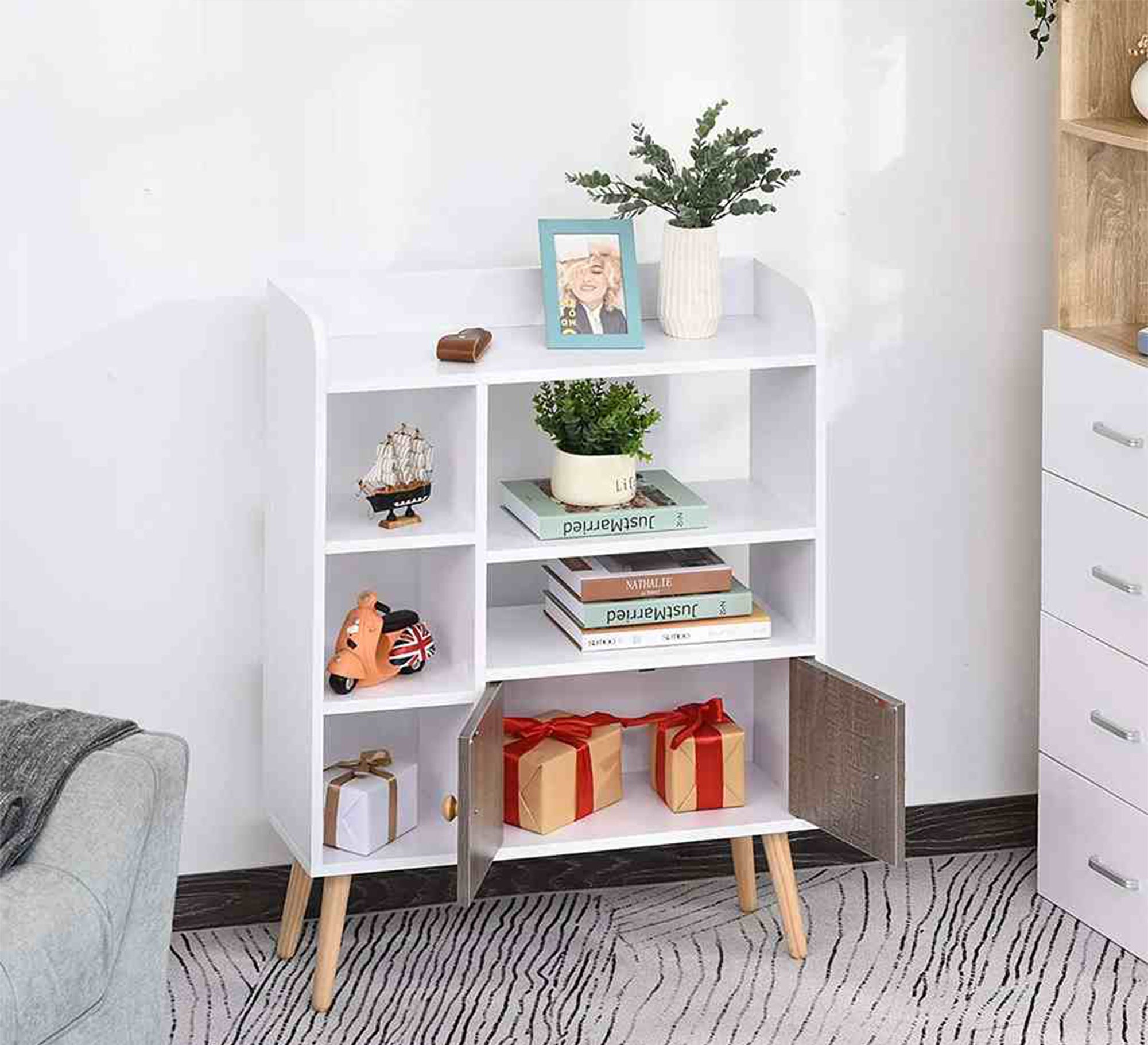 An open shelving unit and two small doors