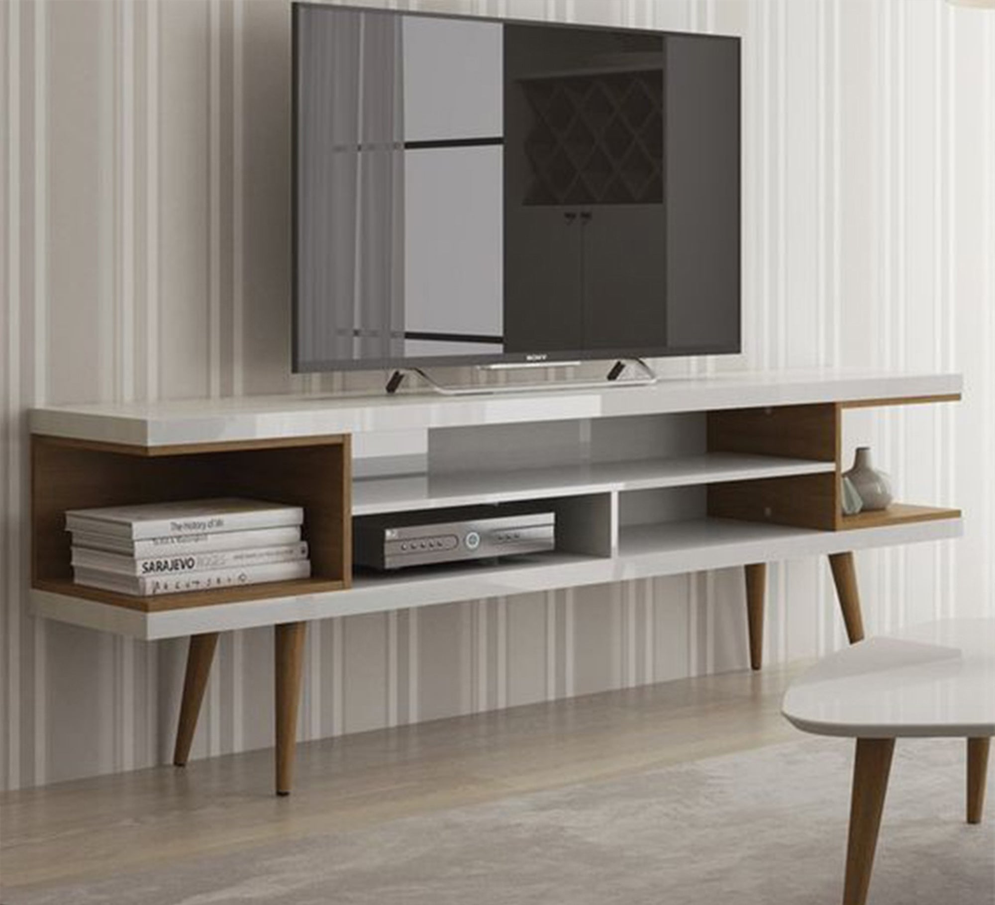 A white TV desk, two wooden shelves, and a beech leg