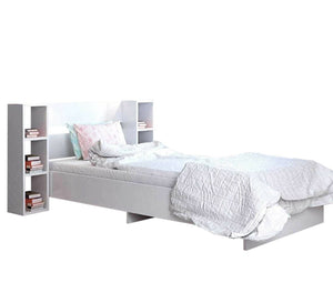 White bed with right and left shelves