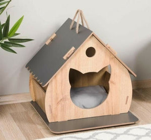 Beige and black wooden cat house