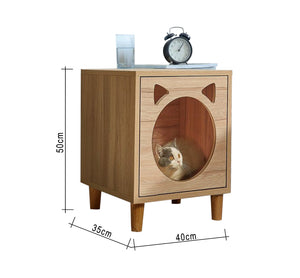 Beige wooden side table and cat house