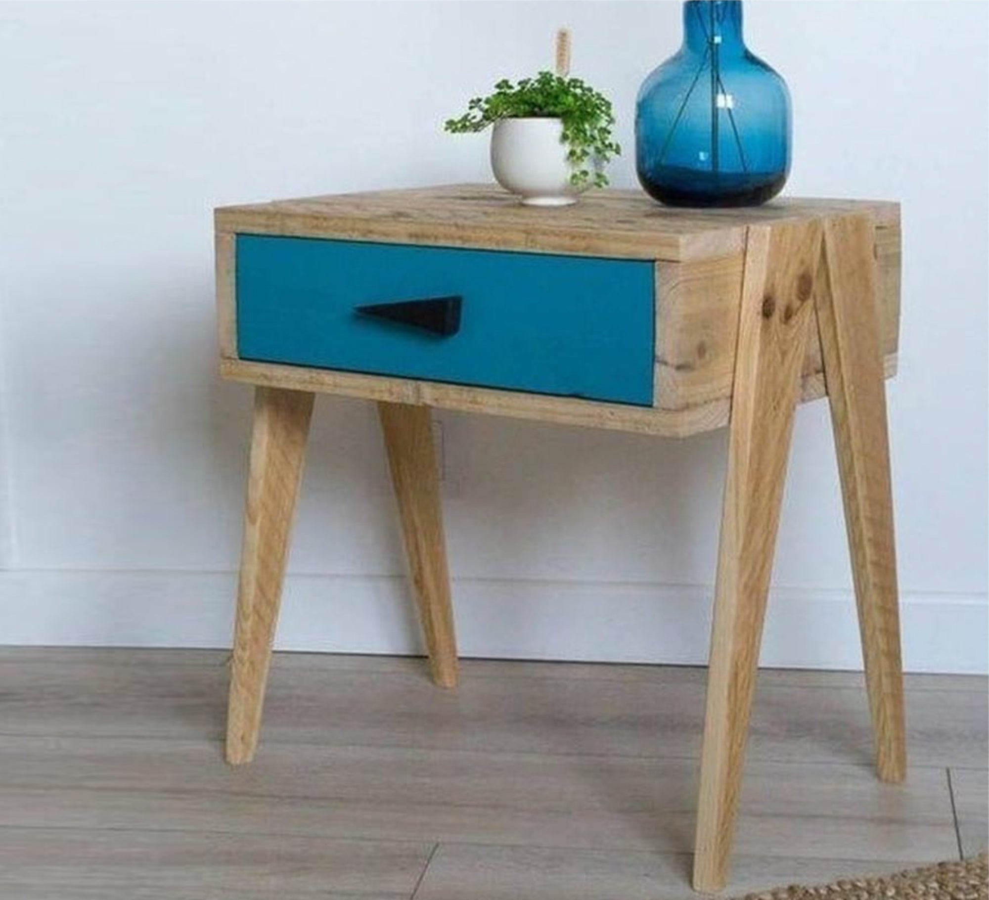 Beige Chest of Drawers with Four Raised Legs