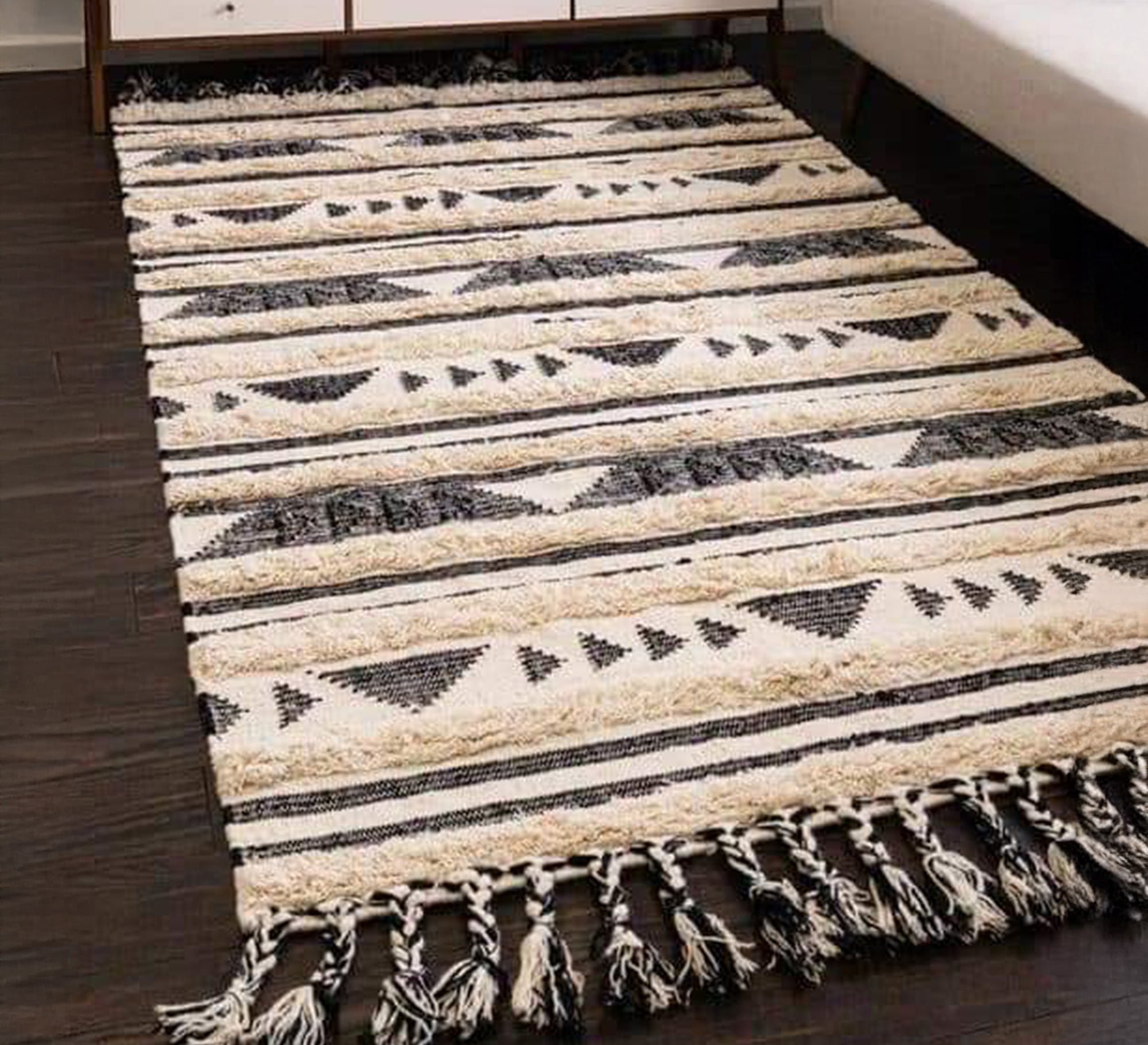 A rug with a variety of patterns