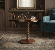 Round serving table with a classic turned design