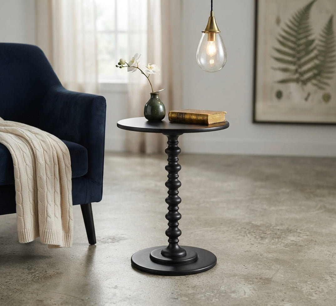 Round serving table with a classic turned design