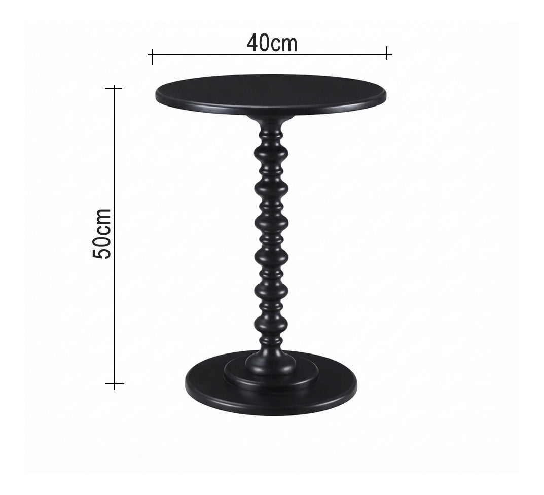 Round serving table with a classic turned design