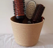 Round jute basket for organizing hairbrushes