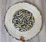 Flat jute base featuring Arabic calligraphy in the center