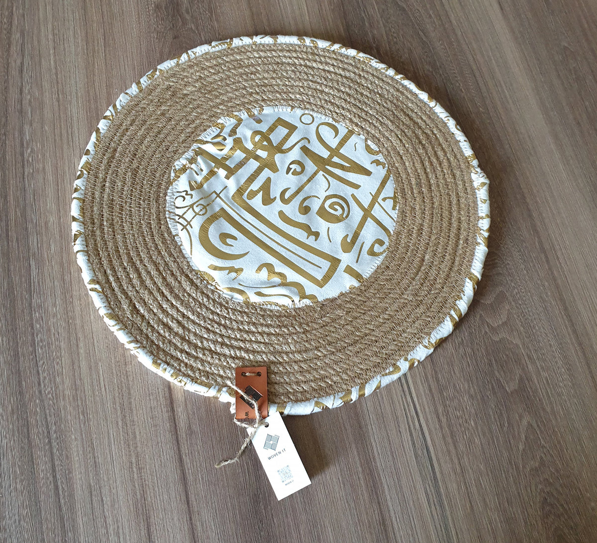 Flat jute base featuring Arabic calligraphy in the center