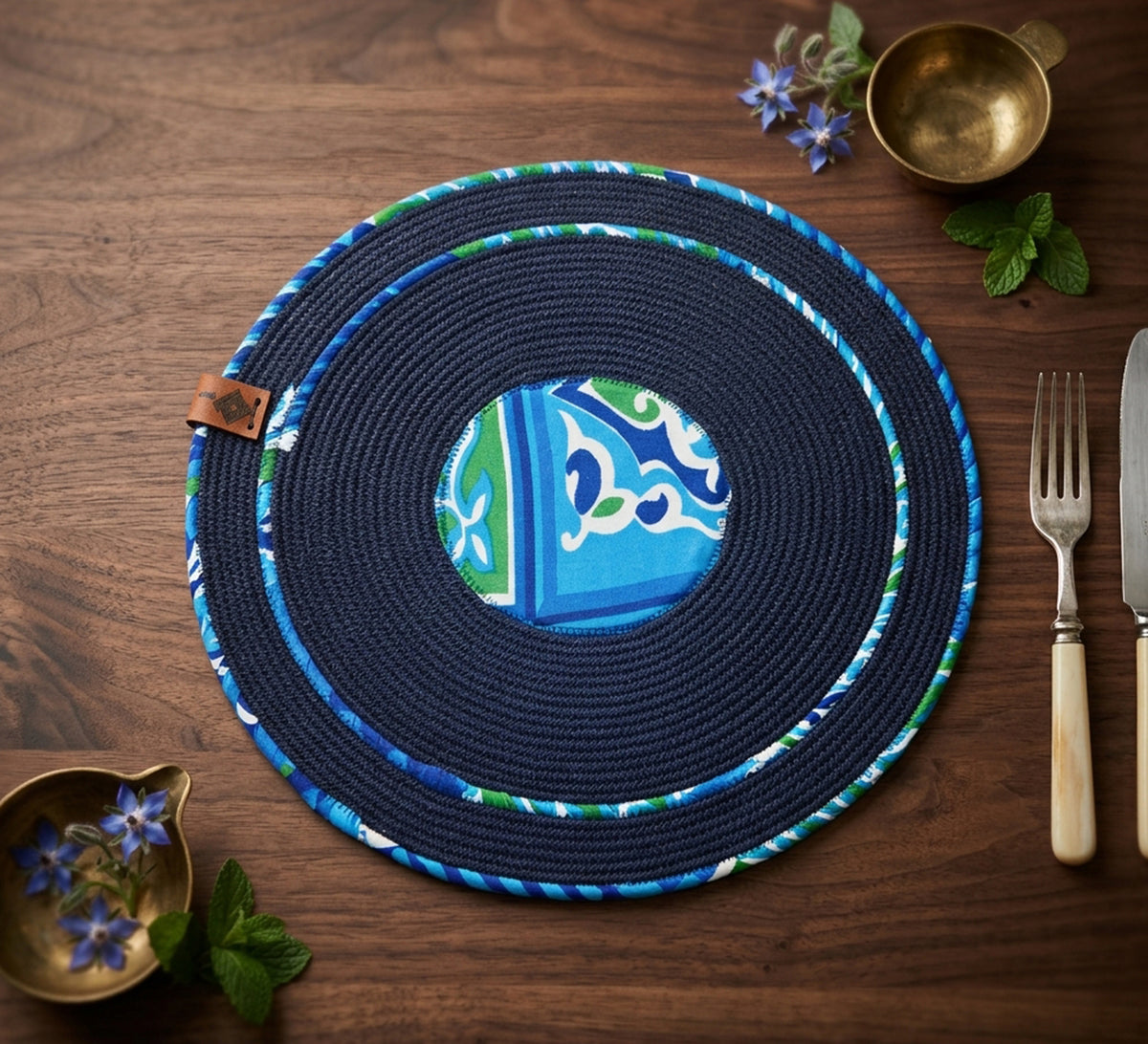 Dark circular tablecloth in blue fabric