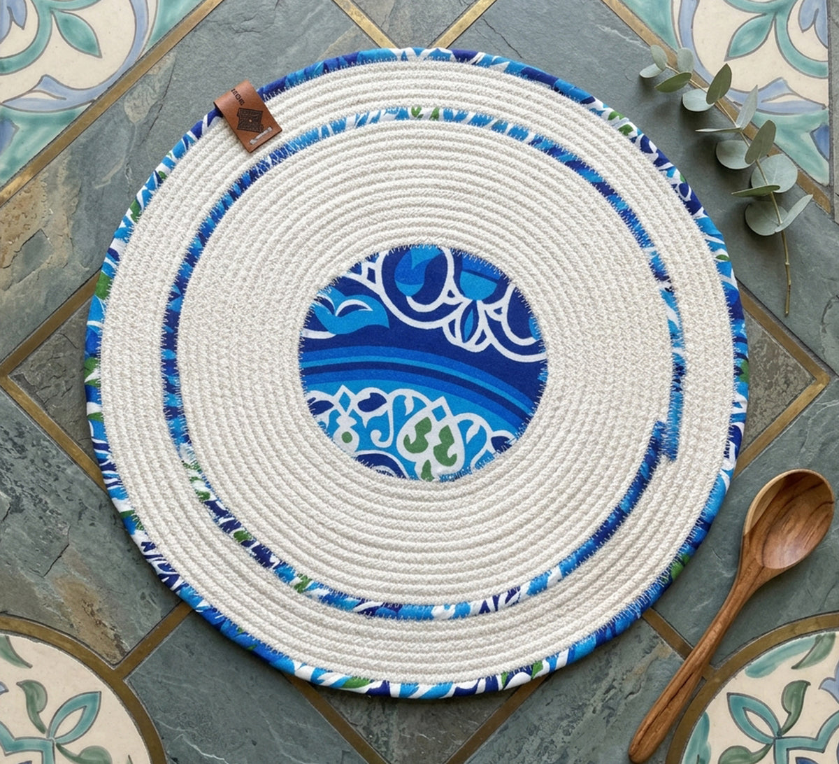 Dark circular tablecloth in blue fabric