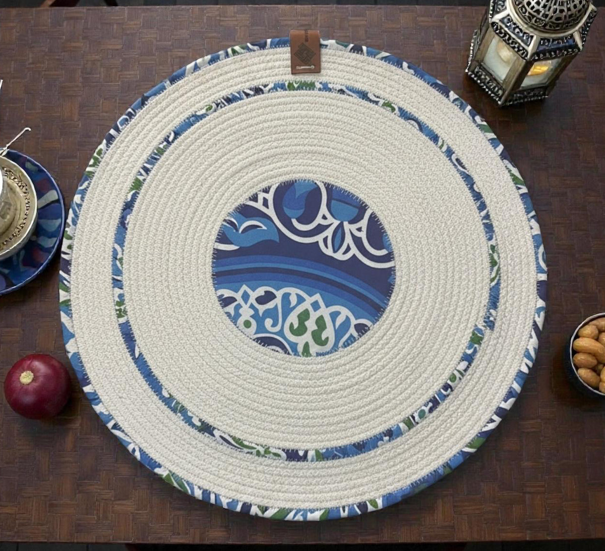 Dark circular tablecloth in blue fabric
