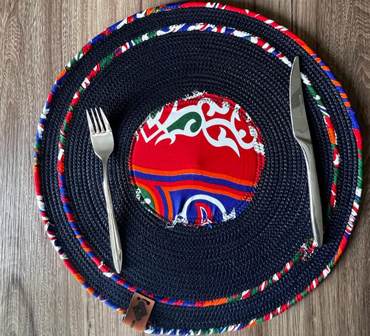 Dark circular tablecloth in blue fabric