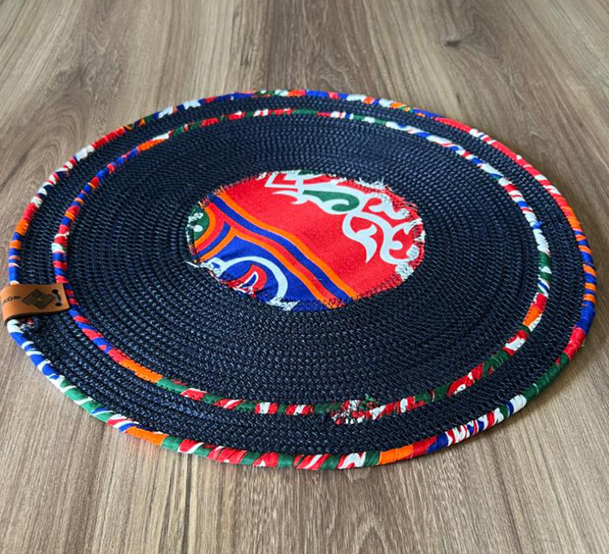 Dark circular tablecloth in blue fabric