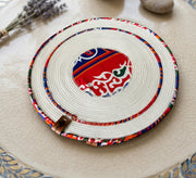 Dark circular tablecloth in blue fabric