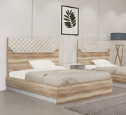 A bed with a headboard decorated with geometric patterns - Vitrine Furniture - Furniture