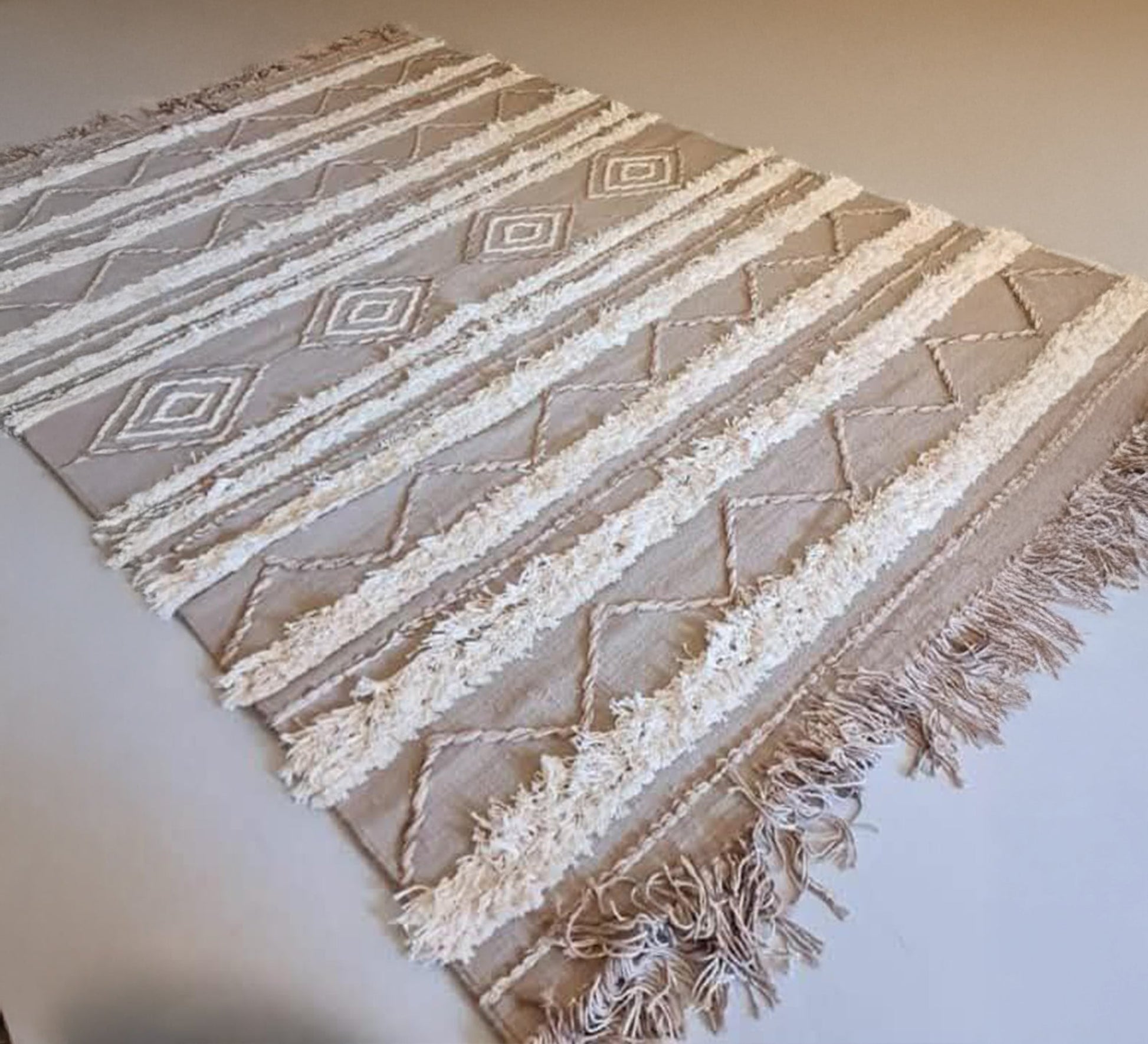 A beige floor rug with prominent stripes and light diamond patterns - Vitrine Furniture - Accessories