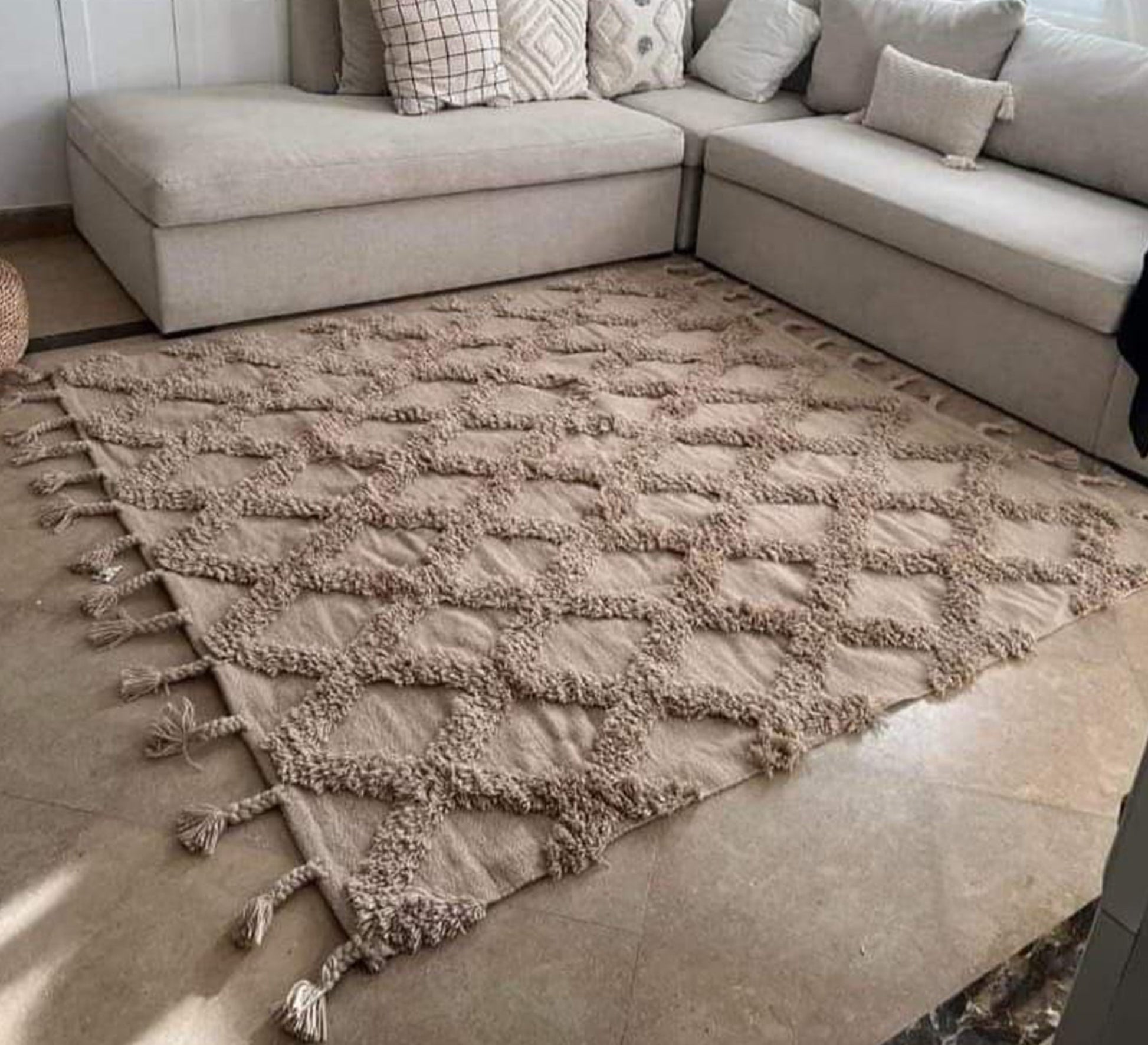 A beige rug with a delicate diamond necklace - Vitrine Furniture - Accessories