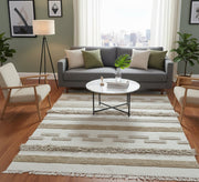 A beige rug with touches of brown and raised patterns - Vitrine Furniture - Accessories