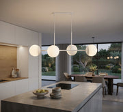 A chandelier offering lighting defined by minimalist simplicity and purity - Vitrine Furniture - Ceiling lights