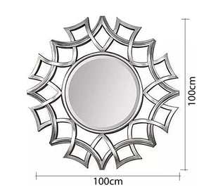 A circular mirror with a frame of hollow overlapping circles - Vitrine Furniture - Décor
