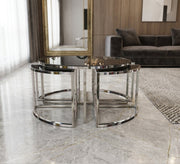 A circular table with four small silver tables - Vitrine Furniture - Coffee Tables