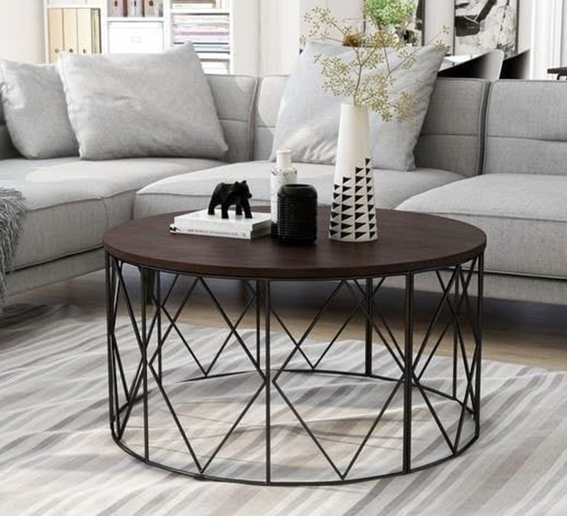 A circular table with overlapping legs in brown - Vitrine Furniture - Furniture