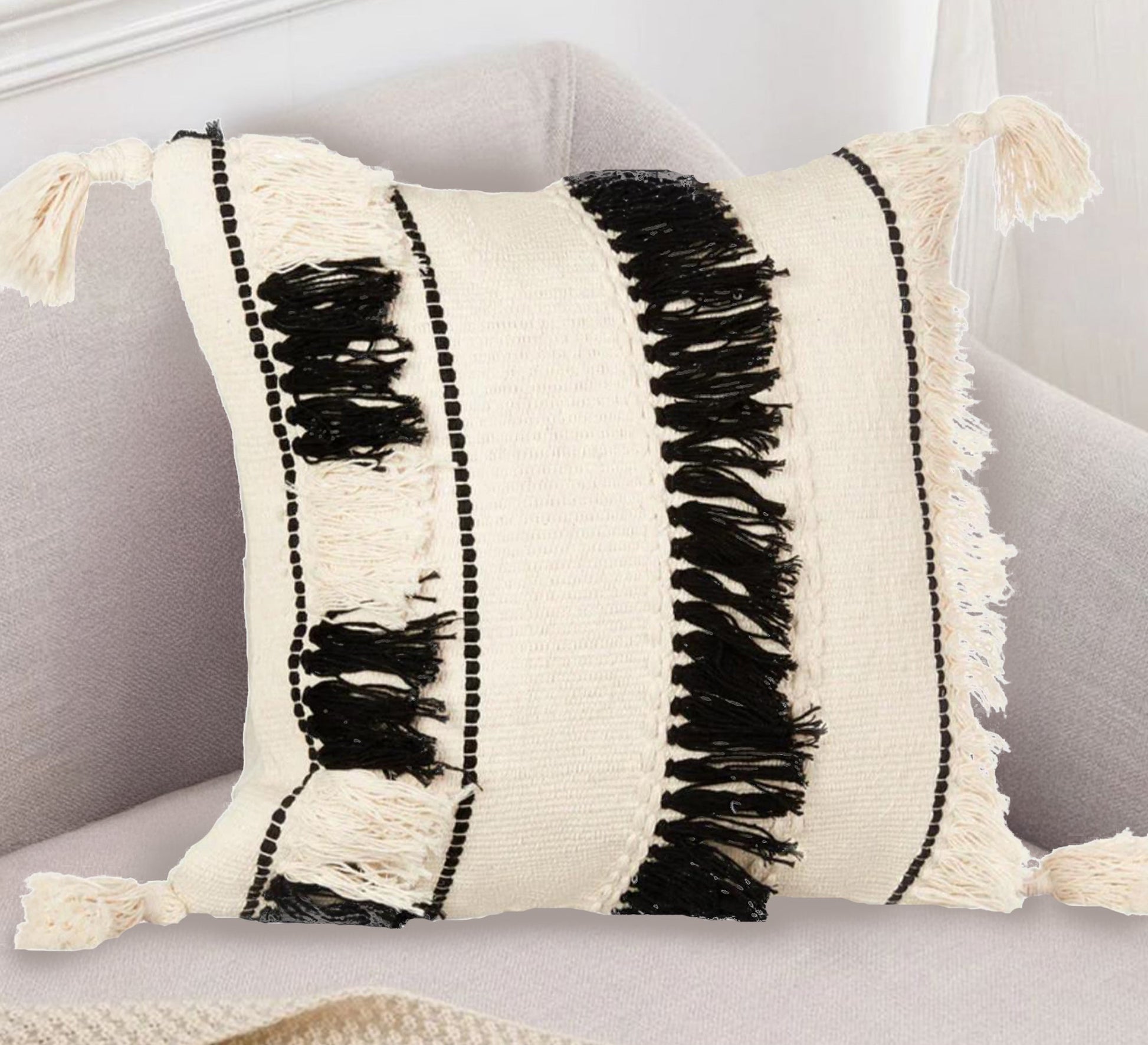 A cushion adorned with dense fringe at its corners - Vitrine Furniture - Accessories