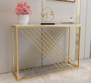 A gold - plated entryway console with a slanted base - Vitrine Furniture - Furniture